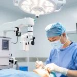 Eye surgeon performing Хараазасахмэсзасал in high-tech operating room, showcasing advanced eye surgery.